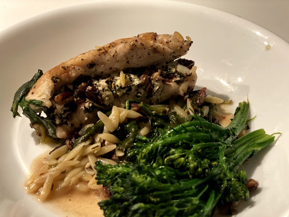 chicken orzo with goat cheese and pecans served with broccolini | forks in the road